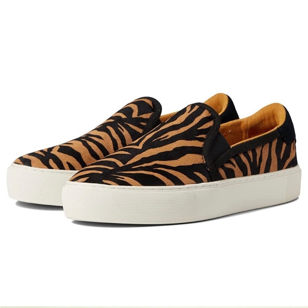 Brand new UGG calf hair tiger print slip on sneakers.
